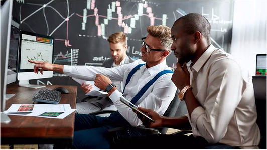 Trading professionals analyzing financial charts